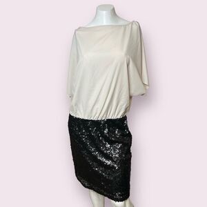 Jennifer Lopez Ivory Top with Connected Black Sequins Skirt Flowly Sleeve